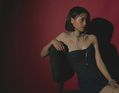 Red wall fashion editorial